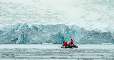 Zodiac crusing in Ciervo Cove, Antarctic Peninsula
